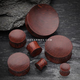 A Pair of Concave Dark Tamarind Wood Double Flared Plug