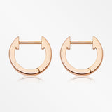 A Pair of Rose Gold Simple Huggie Hoop Steel Earring