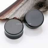 A Pair of Solid Black Flat Glass Double Flared Plug-Black