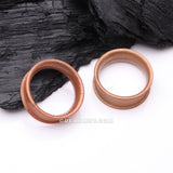 Detail View 1 of A Pair of Ultra Flexible Metallic Bronze Silicone Double Flared Tunnel Plug