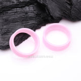 Detail View 1 of A Pair of Ultra Flexible Pastel Pink Silicone Double Flared Tunnel Plug