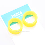 Detail View 4 of A Pair of Ultra Flexible Pastel Yellow Silicone Double Flared Tunnel Plug