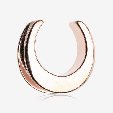 A Pair of Rose Gold Classic Saddle Spreader Double Flared Ear Plug