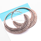 A Pair of Mystic Feather Loop Copper Plug Hoop Earring