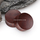 A Pair of Concave Dark Tamarind Wood Double Flared Plug