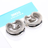 A Pair of White Brass Vicious Viper Snake Saddle Tunnel Plug