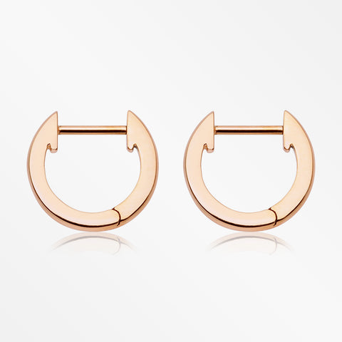 A Pair of Rose Gold Simple Huggie Hoop Steel Earring