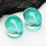A Pair of Green Alien Head Glass Double Flare Plugs
