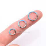 Implant Grade Titanium Brilliant Fire Opal Lined Front Facing Seamless Clicker Hoop Ring-Blue Opal