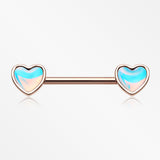 A Pair of Rose Gold Iridescent Revo Heart Nipple Barbell
