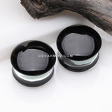 A Pair of Convex Black Front Glass Double Flared Ear Gauge Plug 