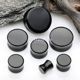 A Pair of Solid Black Flat Glass Double Flared Plug-Black
