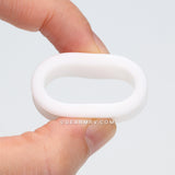 Detail View 2 of A Pair of Flexible Silicone Double Flared Ear Gauge Tunnel Plug-White